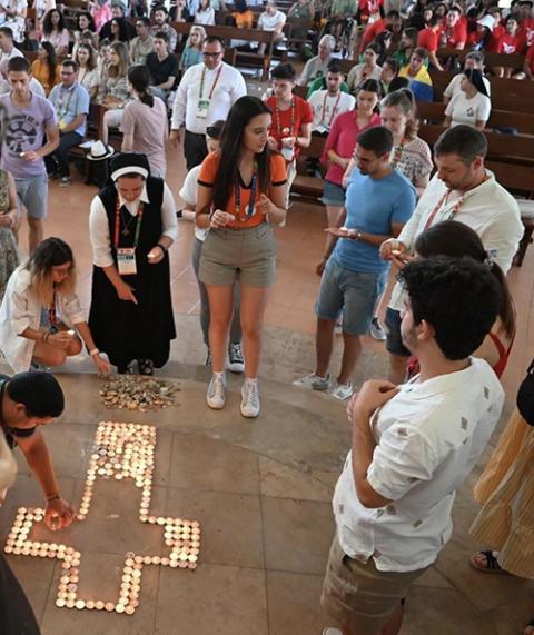 Sr. Maximiliana Şanta leading a Rise Up meeting activity with a group of Romanian young people at World Youth Day in Lisbon, August 2023. (Courtesy of the Sisters of the Order of St. Basil the Great)