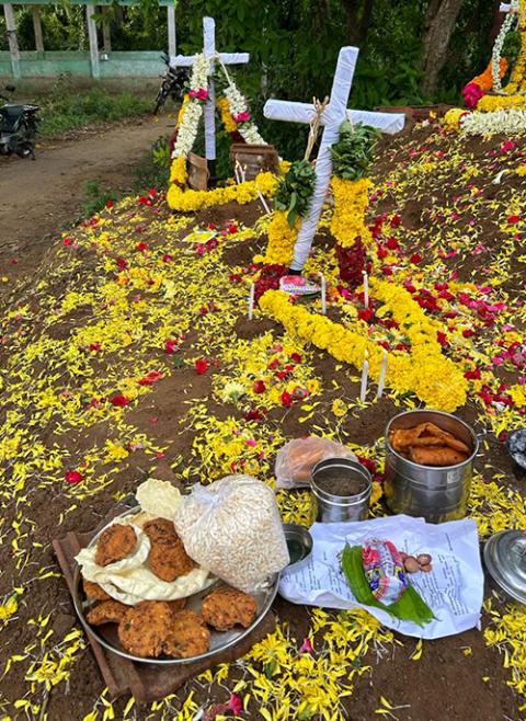 Offerings of vada, papad, betel leaves, and grains at the cemetery in northern Tamil Nadu, India (Robancy A. Helen)