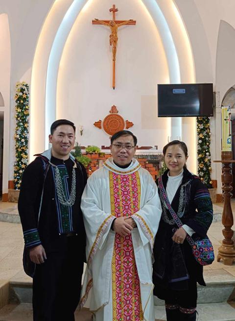 From left, Joseph Ma A Lau, Fr. Joseph Ma A Ca and Therese Giang Thi Xu pose for a picture after their wedding ceremony at Sa Pa Church on Jan. 4. (Courtesy of Joseph Ma A Lau)