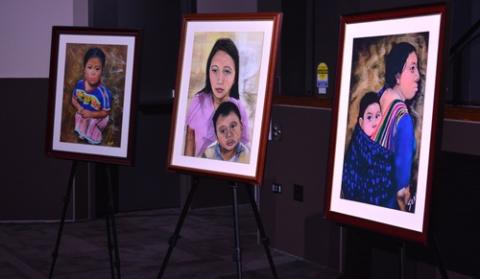 Sister Norma Pimentel, Bishop Kevin Birmingham lecture, Chicago migrants Copies of painting arranged on easels