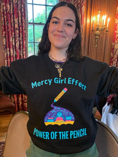 A Mercy student from Rhode Island models the shirt she designed highlighting The Mercy Girl Effect. (Courtesy of Deirdre Mullan)