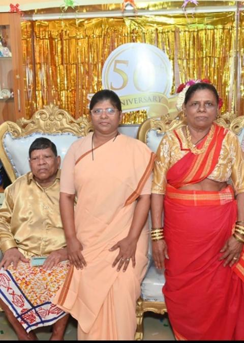 Sr. Rexilla Raymond with her parents on the occasion of their golden wedding anniversary on Feb. 26, 2025. (Courtesy of Rexilla Raymond)