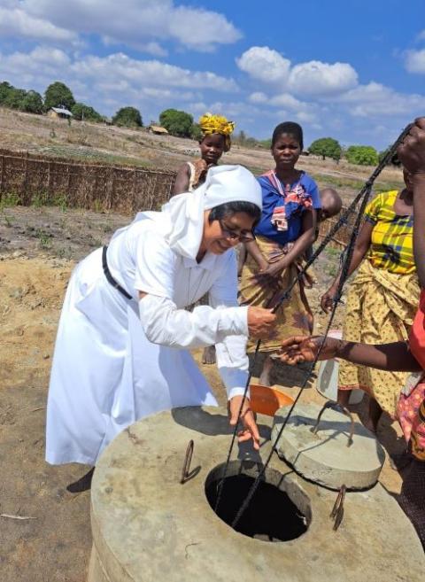 Sister works in field.
