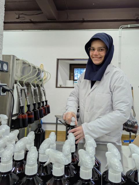 A novice who helps with the packaging in the laboratory A novice who helps with the packaging in the laboratory (Courtesy of Abbaye Notre-Dame des Neiges)