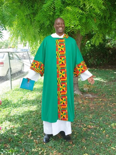 Vestments created by Sr. Jannette Pruitt. (Courtesy of Jannette Pruitt) Green vestments with gold, brown, yellow and red accents in a geometric pattern, created by Sr. Jannette Pruitt being worn