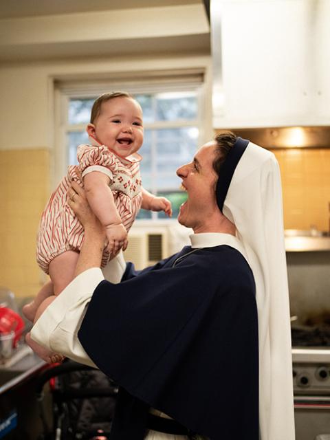Sr. Faustina Maria Pia of the Sisters of Life with one of the babies that have been welcomed at the Holy Respite mission in the sisters' convent (Courtesy of Sr. Catherine Joy Marie)