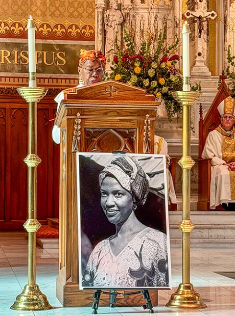 Tanya Britton reads during the liturgy marking the close of the diocesan phase of Sr. Thea Bowman's cause for canonization at the Cathedral of St. Peter the Apostle in Jackson, Mississippi. (Laura Nettles)