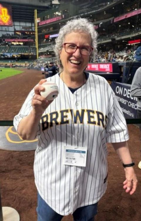 Sr. Debra Sciano poses at a Milwaukee Brewers baseball game June 17, where she threw out the ceremonial first pitch. (Courtesy of Kathy Sciano Lamb)