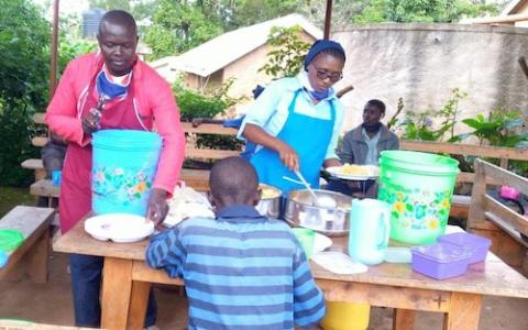 Sr. Winnie Mutuku, of the Daughters of Charity of St. Vincent De Paul in Kenya, shares food with children who live on the streets amid the COVID-19 pandemic. (Courtesy of Winnie Mutuku)