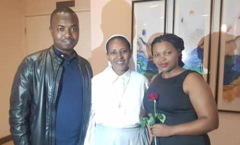 Sr. Immaculate Uwamariya of the Bernardine Sisters with a couple she mentored through Famille Espérance (Aimable Twahirwa)