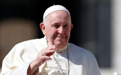 Pope Francis waves as he leaves his Sept. 21 general audience in St. Peter's Square at the Vatican. (CNS/Paul Haring)