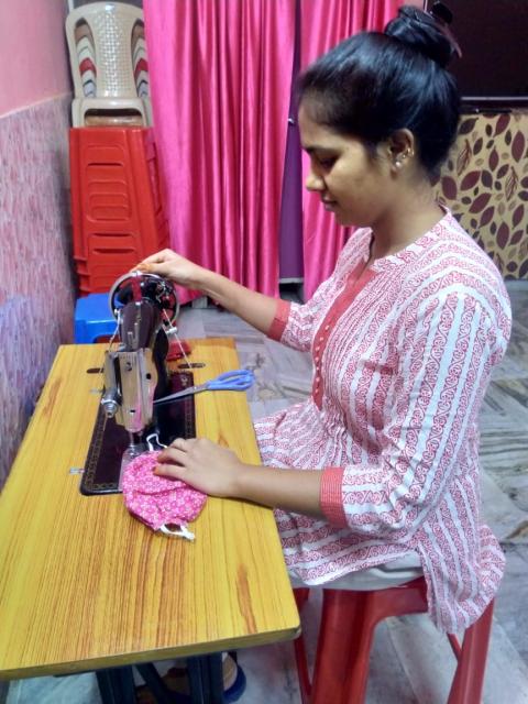 Buli Ranjit, a young kind-hearted girl, stitches masks to share with the needy in her village as Christmas gifts. (Sujata Jena) Buli Ranjit, a young kind-hearted girl, stitches masks to share with the needy in her village as Christmas gifts. (Sujata Jena)