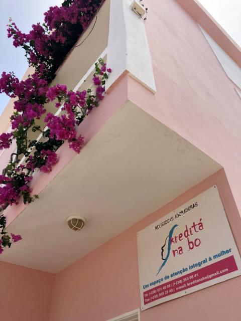 Kreditá na bo's pink building with beautiful flowers that the sisters maintain stands out in its Mindelo neighborhood in Cape Verde. (Dana Wachter) Kreditá na bo's pink building with beautiful flowers that the sisters maintain stands out in its Mindelo neighborhood in Cape Verde. (Dana Wachter)