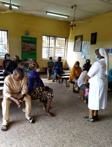 Notre Dame de Namur Sr. Prisca Igbozulike holds a COVID-19 awareness workshop for her patients at St. Catherine of Siena Medical Centre in Lagos, Nigeria. (Patrick Egwu)
