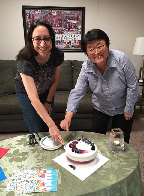 Srs. Sara Tarango and Clara Dong cut a cake celebrating their entrance into the novitiate of the Sisters of St. Joseph of Orange, California.