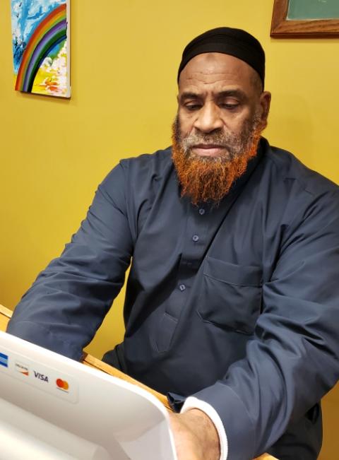 David Brown helps manage a used-clothing boutique store in Philadelphia run by Project HOME and rents and apartment in a building the agency built. (GSR file photo) David Brown helps manage a used-clothing boutique store in Philadelphia run by Project HOME and rents and apartment in a building the agency built. (GSR file photo)