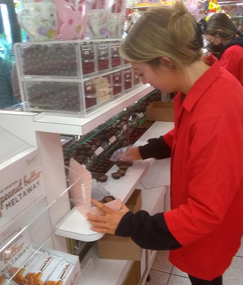 A clerk at Sarris Candies, Inc., Canonsburg, Pennsylvania, packs the author's order on May 30. (Julie A. Ferraro)