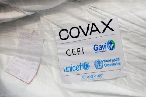 A pack of AstraZeneca COVID-19 vaccines arrive at the international airport in Accra, Ghana, in February. Ghana was the first country to receive vaccines under the global COVAX partnership. (CNS/Reuters/Francis Kokoroko)