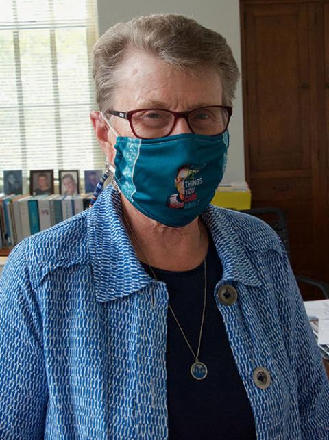Sr. Jane Herb shows off her Ruth Bader Ginsberg mask July 19 in her office at the Sisters, Servants of the Immaculate Heart of Mary motherhouse in Monroe, Michigan. (GSR photo/Dan Stockman)