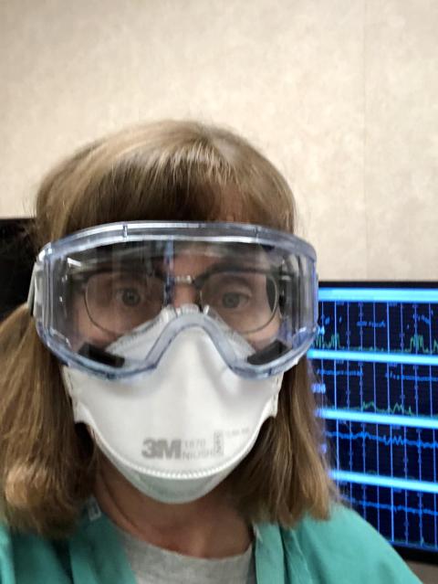 Sr. Mary Kathryn Kramer in her personal protective equipment at work Sr. Mary Kathryn Kramer in her personal protective equipment at work