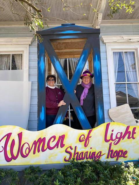 Presentation Srs. Julie Marsh, left, and Mary Lou Specha after their house was turned into a "parade float" for Mardi Gras in New Orleans (Courtesy of Sr. Mary Lou Specha)