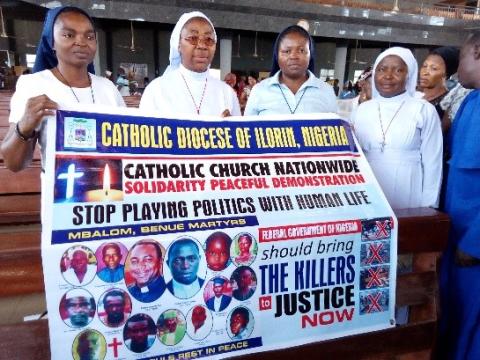 The author and sisters from other congregations in the Catholic Cathedral of Ilorin, Kwara State, Nigeria, during a national march in 2017 to protest the killing of two priests and members of their parish while they were at Mass. (Cecilia Nduaguba)