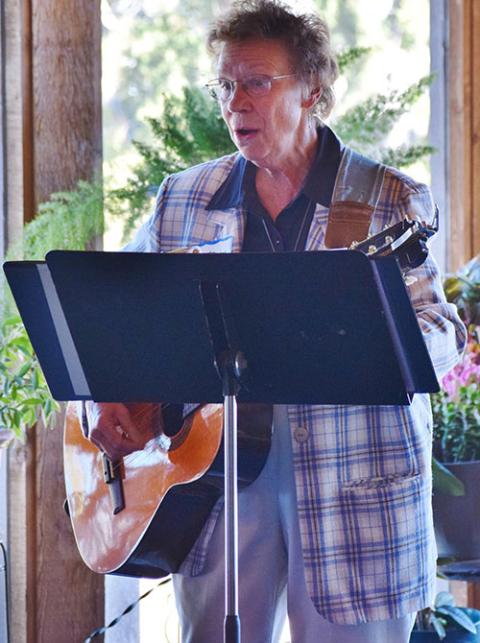 Sr. Patricia Bietsch plays guitar and leads singing at Mass, November 2016 (Provided photo) 