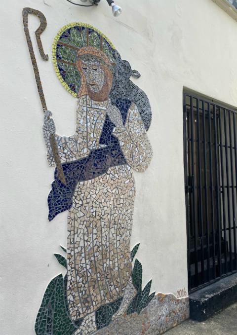 The mosaic on the outside wall of the Home of the Good Shepherd in San Juan, Puerto Rico, was done by a former resident, who has since died. (GSR photo / Soli Salgado)