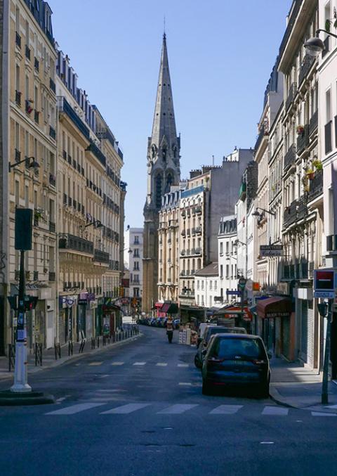 An empty street is seen in Paris under COVID-19 lockdown in April 2020. (Wikimedia Commons/Jeanne Menjoulet)