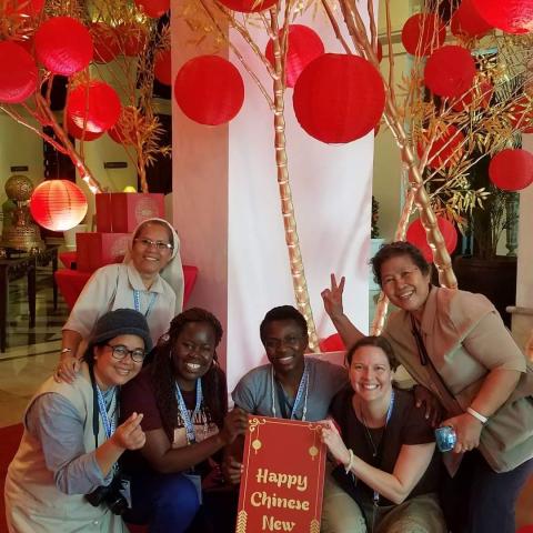 Sisters from the Sisters For Christian Community pose with some Chinese New Year decorations during the community's 2019 international assembly in Manila, the Philippines, in January 2019. (Courtesy of Sr. Margaret Gonsalves)