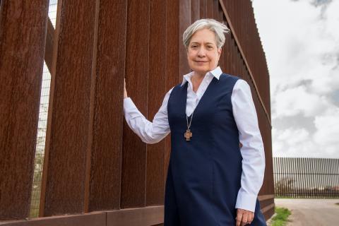 Sr. Norma Pimentel, a member of the Missionaries of Jesus, along a border wall between Texas and Mexico in late February 2018. 