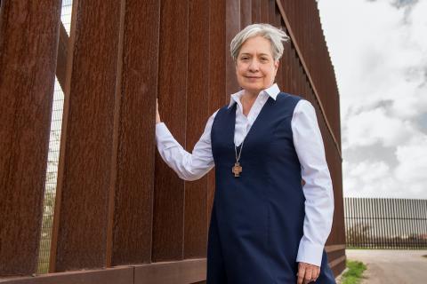 Sr. Norma Pimentel, a member of the Missionaries of Jesus, along a border wall between Texas and Mexico in late February 2018.