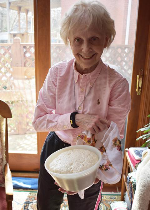 Sr. Suzanne Susany of the Sisters of St. Francis of the Neumann Communities likes to make homemade bread, letting the dough rise before baking. (Julie A. Ferraro)