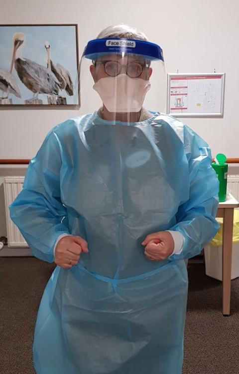 Sr. Lorraine Testa, an Augustinian, Servant of Jesus and Mary, in personal protective equipment (Courtesy of Lorraine Testa) Sr. Lorraine Testa, an Augustinian, Servant of Jesus and Mary, in personal protective equipment (Courtesy of Lorraine Testa)