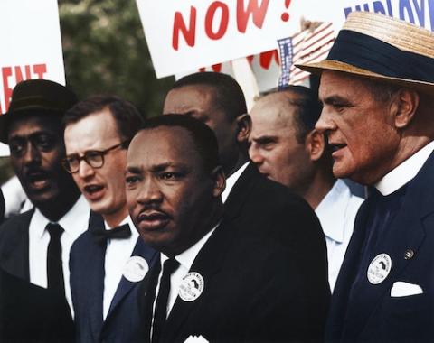 Dr. Martin Luther King, Jr., center, at the August 1963 March on Washington (Unsplash/Unseen Histories) Dr. Martin Luther King, Jr., center, at the August 1963 March on Washington (Unsplash/Unseen Histories)