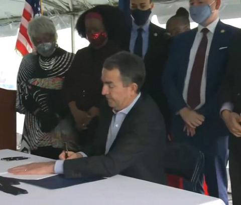 Virginia Gov. Ralph Northam signs legislation outside the Greensville Correctional Center in Jarratt March 24, making Virginia the 23rd state to abolish the death penalty. (CNS screenshot/Courtesy of Catholic Herald)
