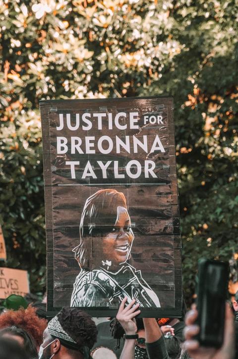 A protester holds up a sign calling for justice for Breonna Taylor at a Black Lives Matter protest in Atlanta. (Photo by Maria Oswalt on Unsplash) A protester holds up a sign calling for justice for Breonna Taylor at a Black Lives Matter protest in Atlanta. (Photo by Maria Oswalt on Unsplash)