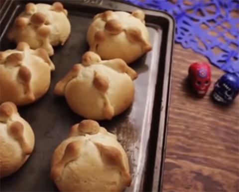 Students taught us how to make pan de muerto, adding each ingredient, kneading and shaping the "bones" that decorate the top of this sweet bread. (Screenshot by Martha A. Kirk) Students taught us how to make pan de muerto, adding each ingredient, kneading and shaping the "bones" that decorate the top of this sweet bread. (Screenshot by Martha A. Kirk)