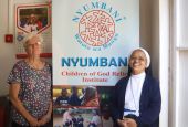 Sr. Tresa Palakudy of the Sisters of the Adoration of the Blessed Sacrament, right, poses with Sr. Julia Mulvihill of the Sisters of St. Francis of Philadelphia at Nyumbani Children's Home for orphans living with HIV/AIDS. (Wycliff Oundo)