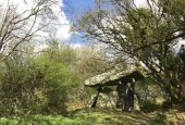 The author at Gaulstown Portal Dolmen, a megalithic portal tomb in County Waterford, Ireland, in April 2021 (Courtesy of Kathryn Press)