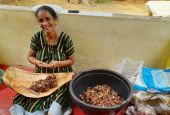Lucy D'Souza prepares pickled tamarind to sell in the market in Mangaluru, southern India. (Courtesy of Clara D'Cunha)