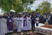 Members of the Archdiocese of Juba, South Sudan, attend the Aug. 20, 2021, burial of Srs. Mary Daniel Abut and Regina Roba, Sisters of the Sacred Heart who were killed when their bus was attacked Aug. 16. (Courtesy of Christy John)