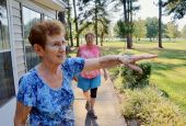 Dwelling Place Sr. Clare Van Lent shows the grounds of the community's retreat center in Brooksville, Mississippi, in September 2019. Behind her is Sr. Mary Horrell. (GSR photo / Dan Stockman)