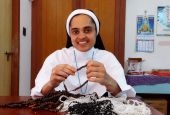 Sr. Rini Rose of the Sisters of the Adoration of the Blessed Sacrament makes rosaries at her community's convent in Ambalavayal, Kerala, India. (Courtesy of the Sisters of the Adoration of the Blessed Sacrament)