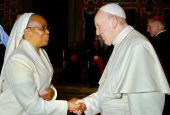 Sr. Jane Wakahiu greets Pope Francis in July 2018. (Courtesy of the Conrad N. Hilton Foundation)