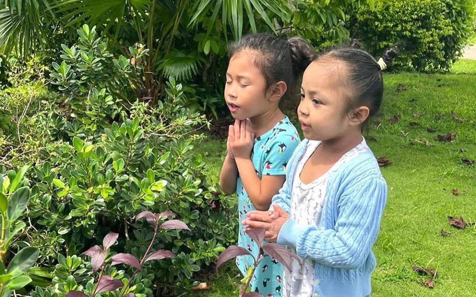 As part of their service activities to mark the five-year anniversary of Mercy Education, children at Infant of Prague Catholic Nursery and Kindergarten in Mangilao, Guam, pray for different intentions. (Courtesy of Mercy Education)