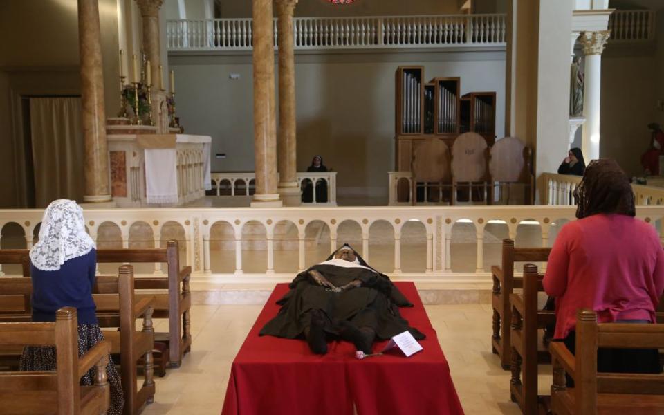 The exhumed body of Sr. Mary Wilhelmina Lancaster, foundress of the Benedictines of Mary, Queen of Apostles, lies in repose in the church at the Abbey of Our Lady of Ephesus in Gower, Mo., May 21. (OSV News photo/Megan Marley)