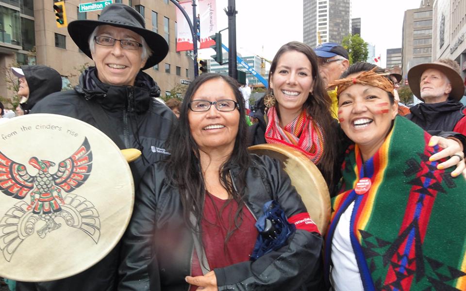 Sr. Norma McDonald, left, participates in a walk during the Truth and Reconciliation Committee in Vancouver 2013 with Nora Martin (Tla-o-qui-aht First Nation), Janelle Delorme (a réconciliACTION participant 2013) and Margaret Eaton (Tla-o-qui-aht First Nation). (Courtesy of Sr. Norma McDonald)