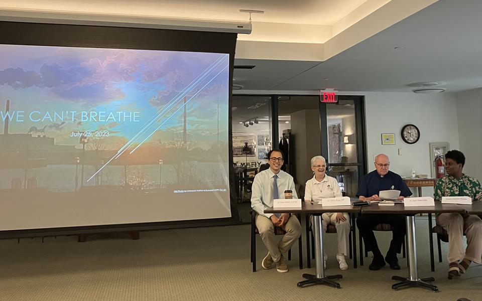 "We Can't Breathe" panelists address about 45 attendees at the Sisters, Servants of the Immaculate Heart of Mary motherhouse, July 25 in Monroe, Michigan. Pictured, left to right, are Alexander Rabin, Ginny King, Alex Steinmiller and Heather Boone. (Amy Ketner)