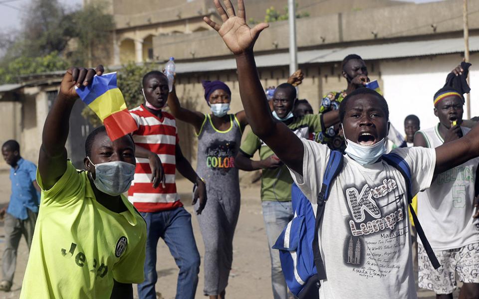 People protest in N'Djamena, Chad, on April 27, 2021, after Mahamat Idriss Déby declared himself the head of the country's Transitional Military Council. (AP/Sunday Alamba)